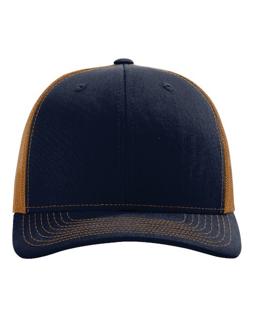 Baseball cap in navy with brown contrast brim and side panels.