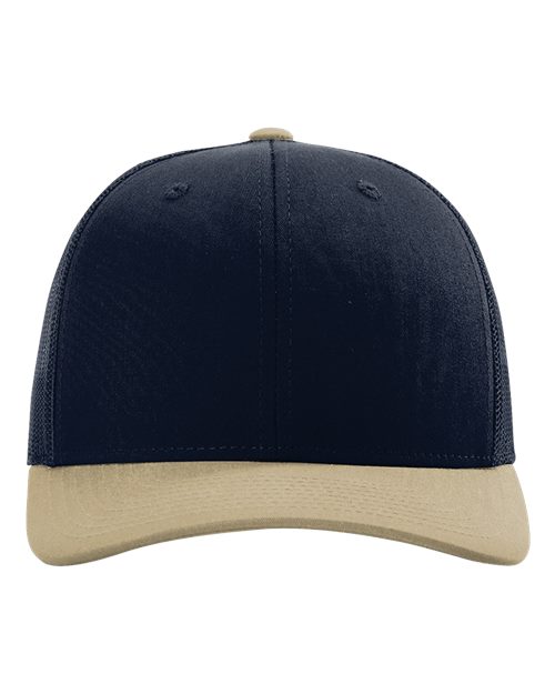 Baseball cap in navy with beige contrast brim and top button.