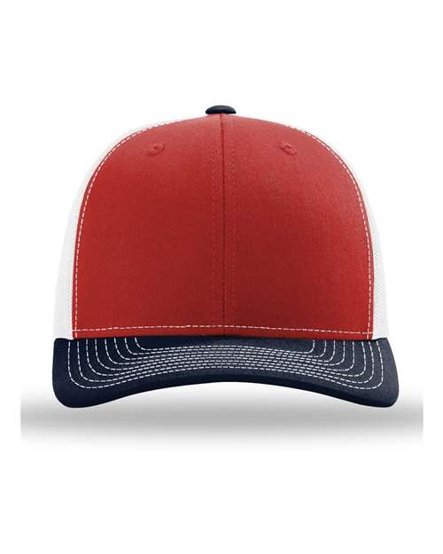Trucker cap with red front panels, white mesh sides, and navy curved brim
