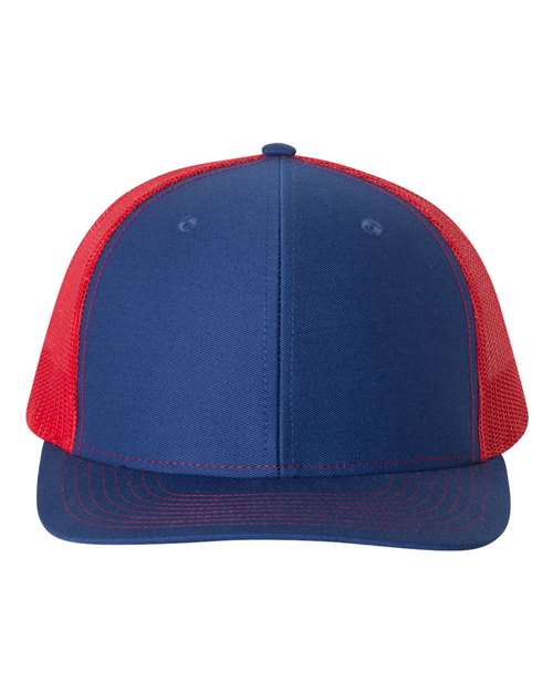 Trucker cap with dark blue front, red mesh sides, and navy curved brim