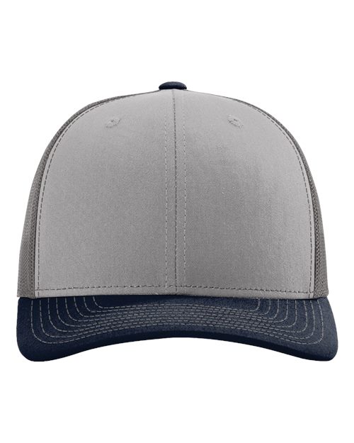 Light gray baseball cap with navy patterned brim and small front ventilation eyelets.